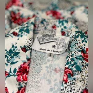 Barely worn Vivien Holloway two piece skirt and crop jacket top. True to size